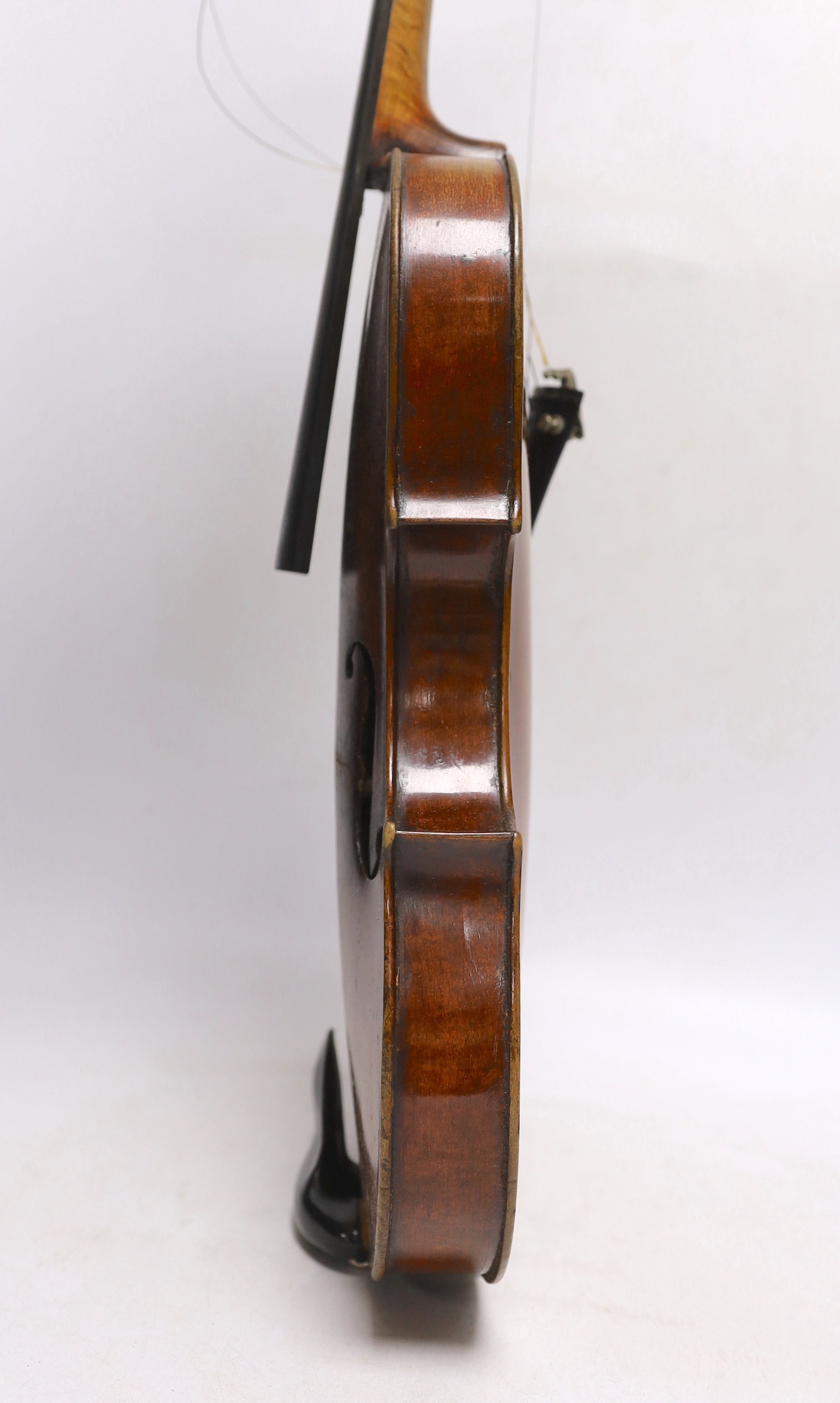 A violin labelled 'Albani Palermo', cased, length of back 35.5cm